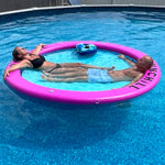 Load image into Gallery viewer, Two people relaxing in a Sunchill Water Hammock in the pool

